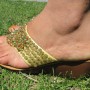 Hand-beaded wedged-heel thong sandals