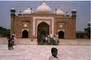 Posing with Indian children in front of Mini Red Taj 