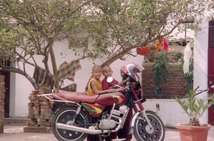 young monks and motorcycle